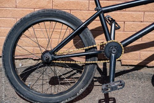 BMX bicycle near red wall