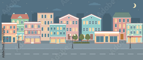 City life illustration with house facades, road and other urban details.  Night panoramic view. Flat style, vector illustration.