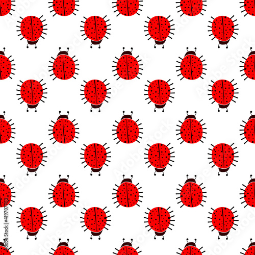 Seamless pattern with red ladybugs.
