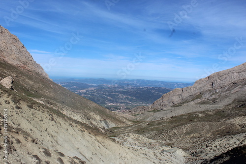  A picture of a series of mountains and a clear blue sky 