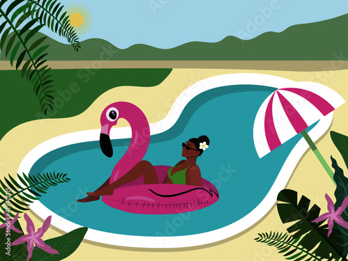 Young woman sunbathing near pool with pink flamingo