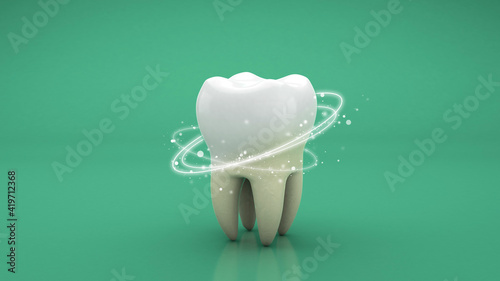 Teeth whitening. Cleaning the tooth from tartar with rays. Green background. 3d render photo