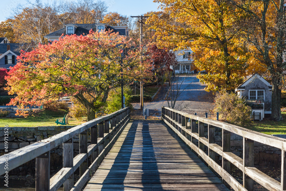 USA, Massachusetts, Cape Ann, Gloucester. Annisquam Harbor, footbridge during autumn.