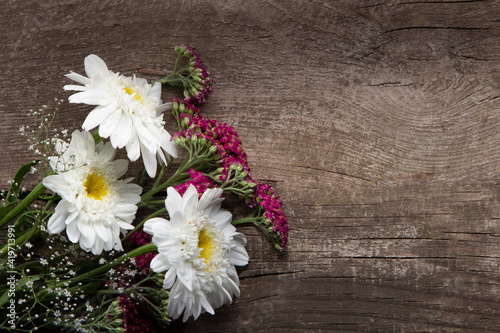 flowers bouquet on wooden b...