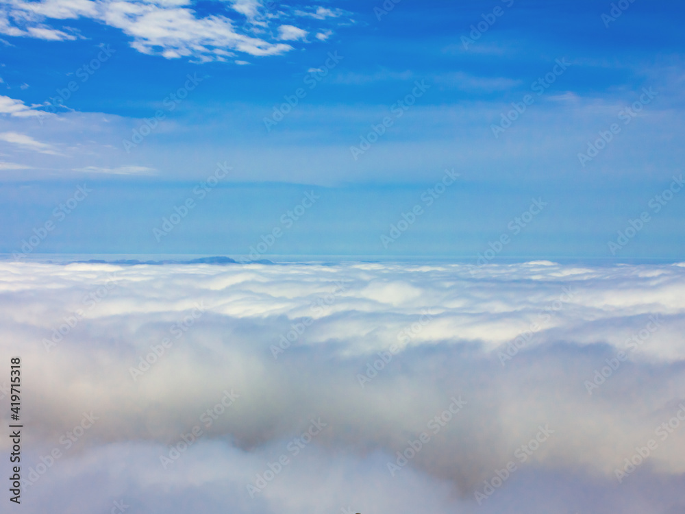 view of clouds from the top of the mountain