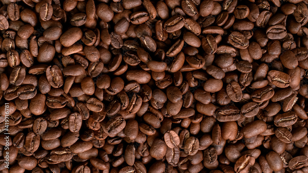 Fototapeta premium Roasted Coffee Beans Texture background. close-up.