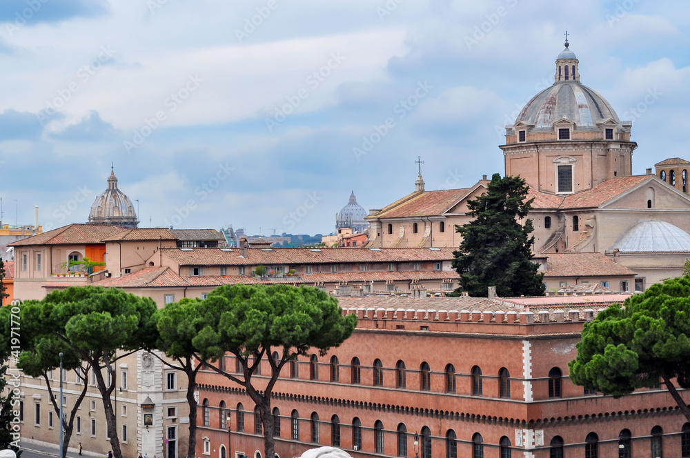 Domes of churches and cathedrals seen from Piazza Venezia square in Rome, Italy