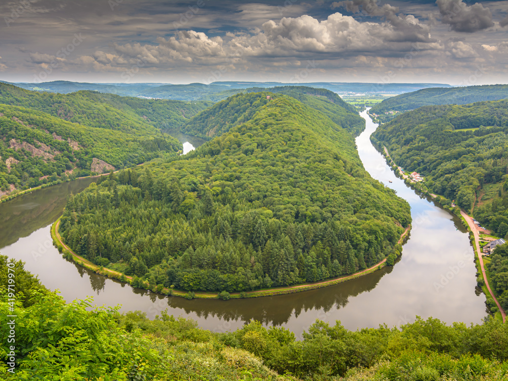 Fototapeta premium landscape with river and mountains. View from above at Cloef of the the river Saar in Germany