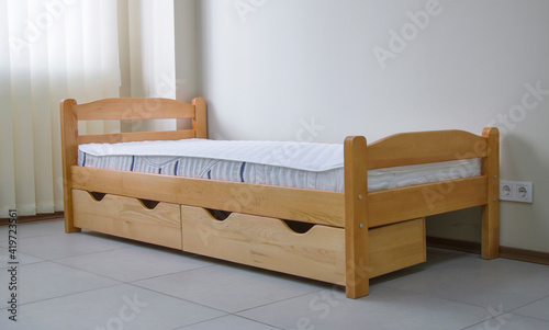 single bed with drawers in wood lacquered