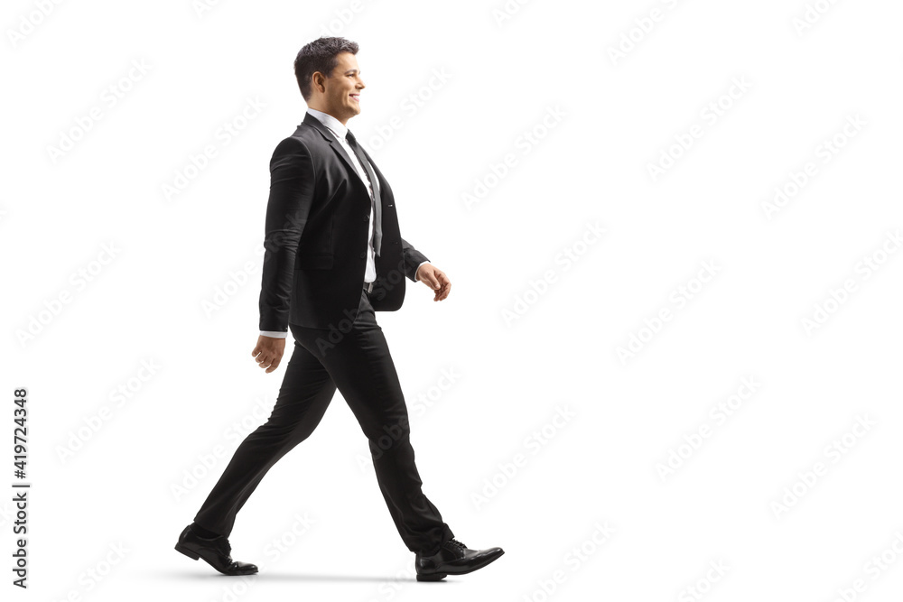 Full length profile shot of a businessman walking Full length profile shot of a businessman walking