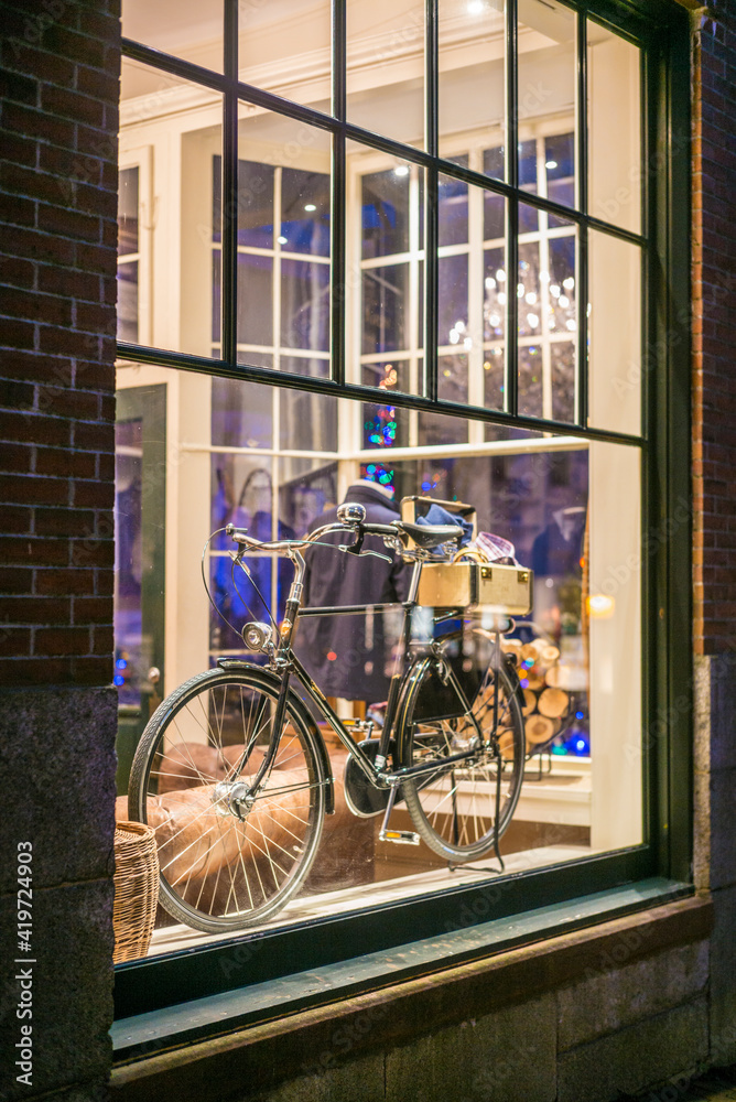 USA, Massachusetts, Nantucket Island. Nantucket Town, store window with bicycle.