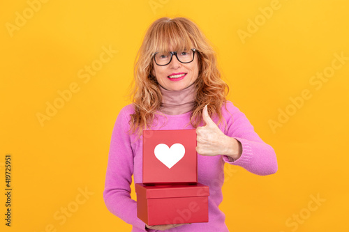 woman with gift box with heart, valentine