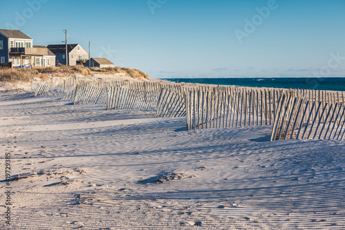 USA, Massachusetts, Nantucket Island. Madaket. Madaket Beach, beach houses and sand fences photo