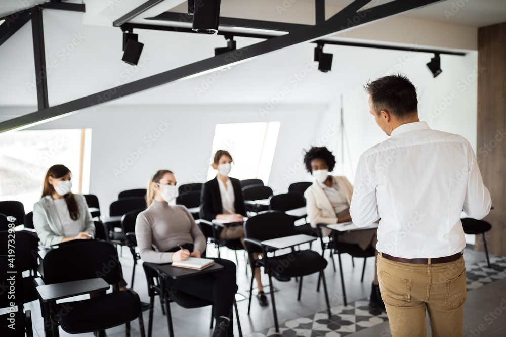 People on a business meeting or a seminar.