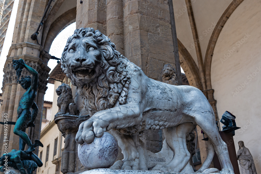 Beautiful statue of lion at famous Loggia dei Lanzi in Florence, Italy