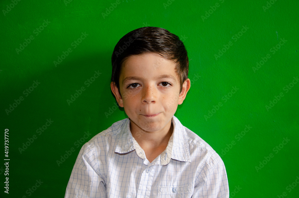 Funny hairstyle model child on green background Funny hairstyle model child on green background