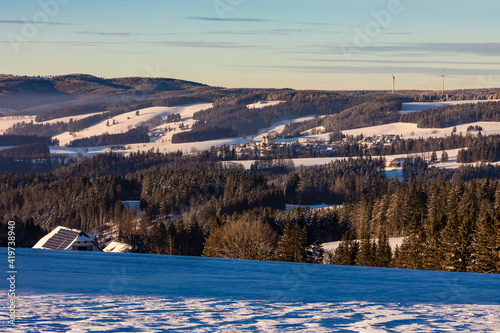 Germany, Baden-Wurttemberg, Sankt Margen, Town in middle of Black Forest at winter dusk photo