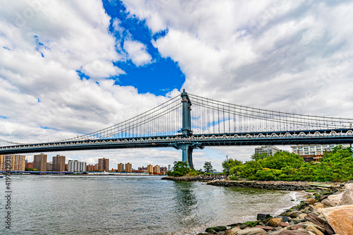 Manhattan Bridge over East River Brooklyn Historical Society DUMBO and waterfront condominium Manhattan New York City Wide angle view