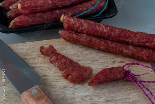 Chinese Sausage on wooden board photo