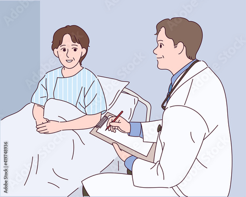 A doctor is treating a patient lying in a hospital bed.
