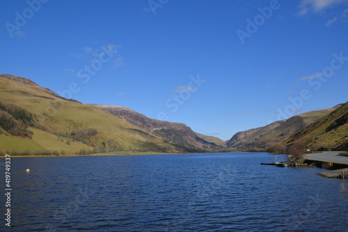 a view of tal-y-llyn lake looking over to the valley in the background photo