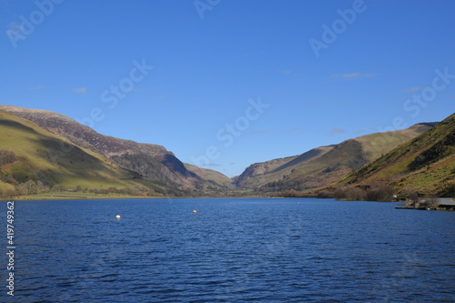 a view of tal-y-llyn lake looking over to the valley in the background