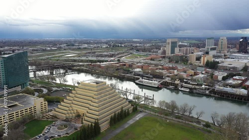 Flying over the city of Sacramento from West Sacramento and over the Sacramento River near Tower Bridge. photo