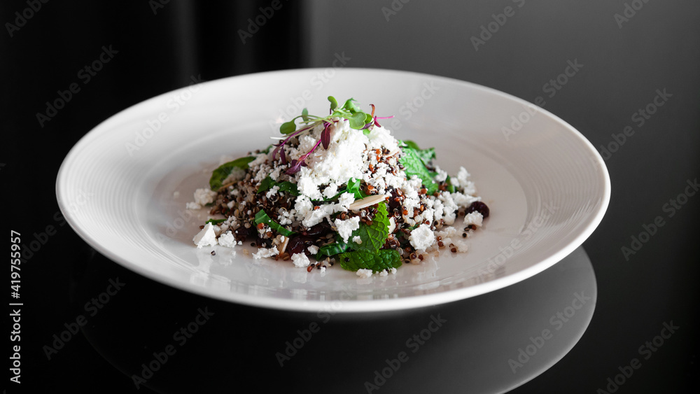 Quinoa salad with feta cheese and almond and mint leaves Quinoa salad with feta cheese and almond and mint leaves