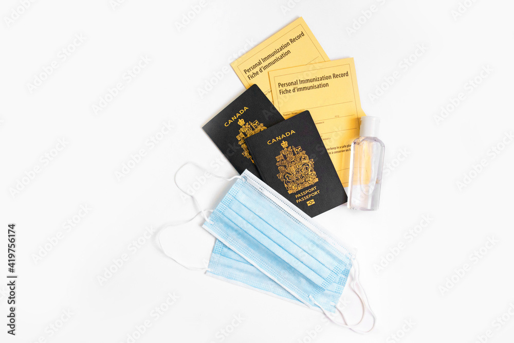 Two Canadian Passports With Yellow Immunity Vaccination Records Face   1000 F 419756174 QxrPmoXsa5O2FQwcPY2g9dcITAIWBA4r 