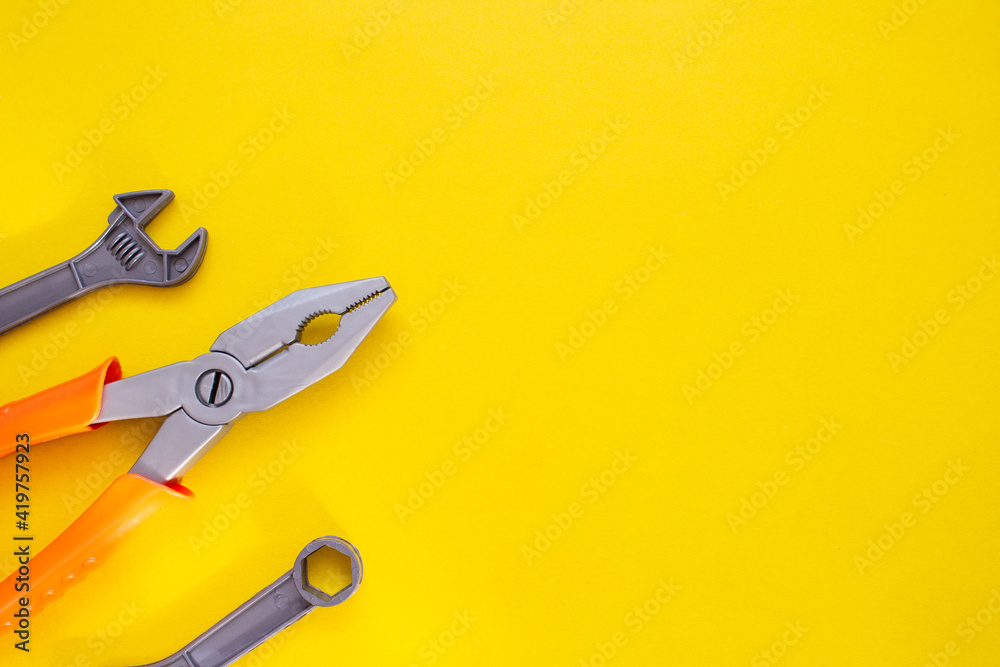 Set of children's plastic tools on an isolated background.