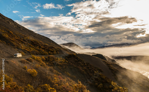 dramatic autumn landscape photo of he mountain peaks and valleys inside the Denali National Park in Alaska