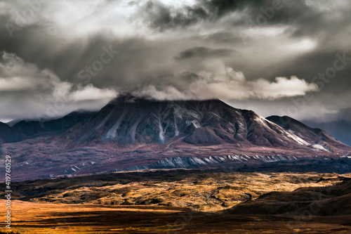 dramatic autumn landscape photo of he mountain peaks and valleys inside the Denali National Park in Alaska © Nathaniel Gonzales