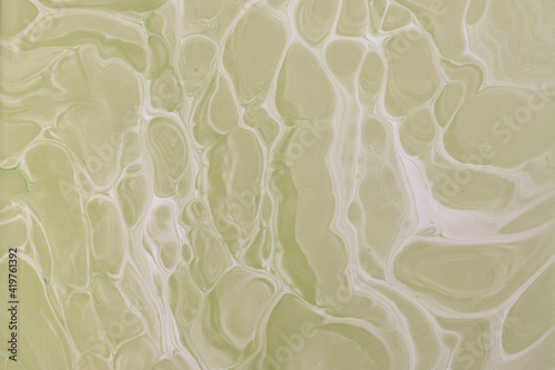 Abstract fluid art background light green and white colors. Liquid marble.