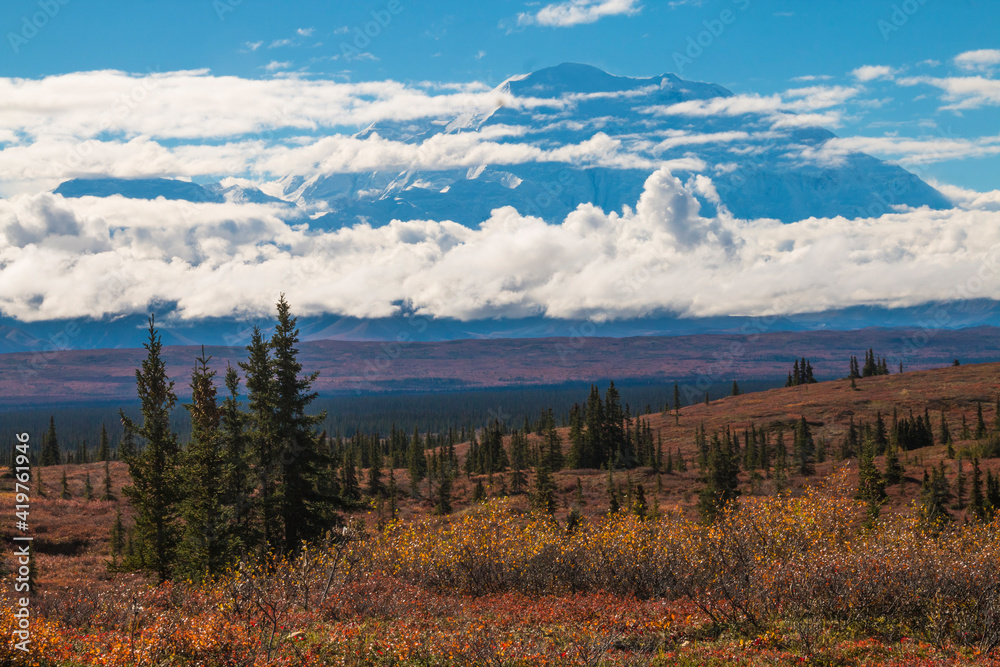 dramatic photo of Mt. McKinley in autumn inside Denali national Park in Alaska.