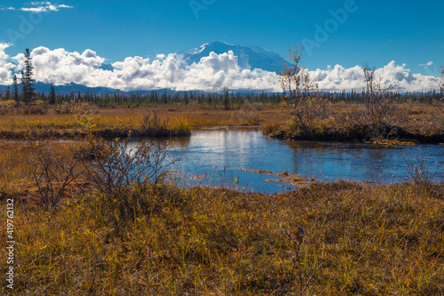 dramatic photo of Mt. McKinley in autumn inside Denali national Park in Alaska.