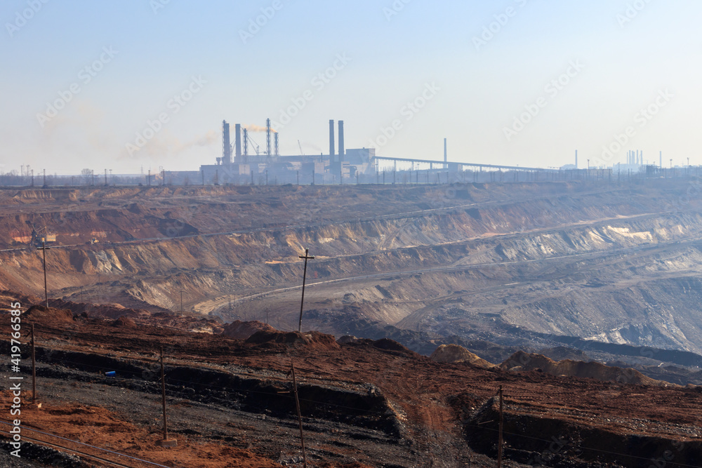View of the iron ore quarry in morning haze