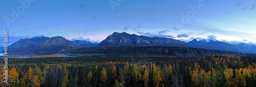panoramic shot of the Wrangell St Elias mountain range viewed from the Copper River in Alaska during autumn 