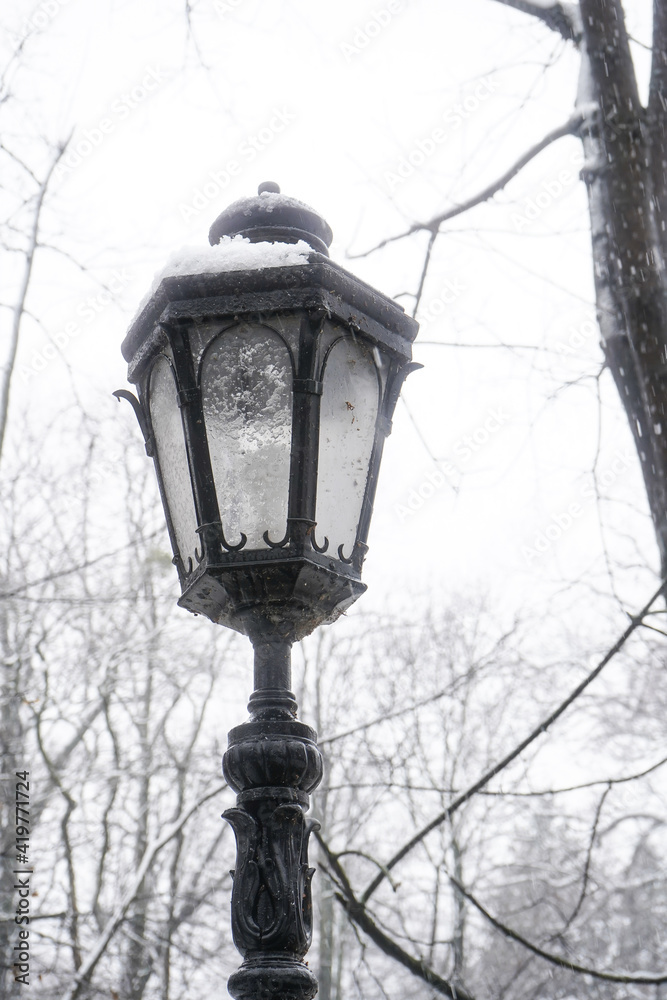 Street lantern. Public lighting. Photo during the day.