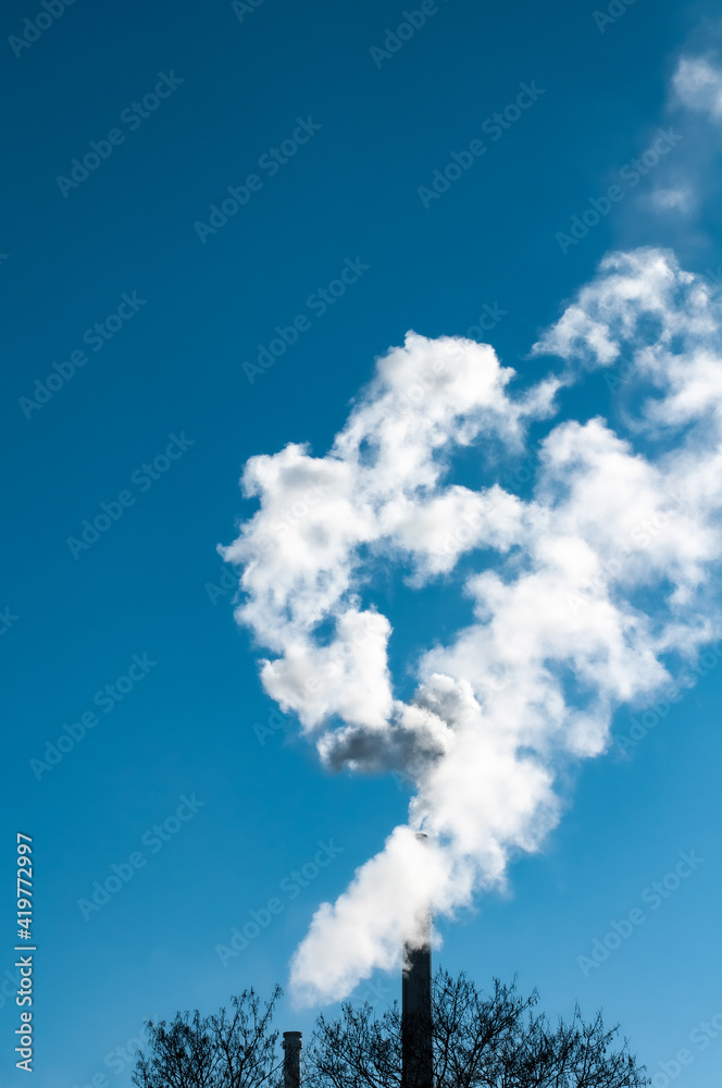 the smoking chimneys of a thermal power station the smoking chimneys of a thermal power station