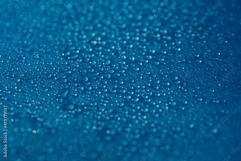 Drops blue texture. Wet water on glass background. Bubble pattern.