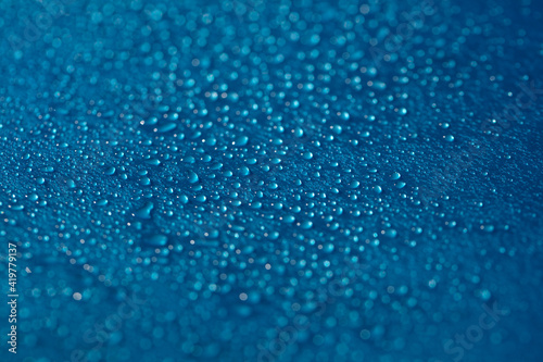 Drops blue texture. Wet water on glass background. Bubble pattern.