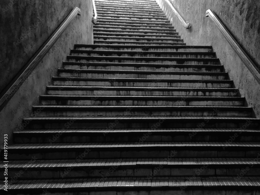 Grungy stairways at the entrance of a Bucharest subway station.