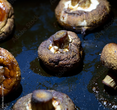 Baked mushrooms champignons in the oven.