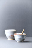Traditional, handcrafted ceramic on gray background. Soft focus. Copy space.