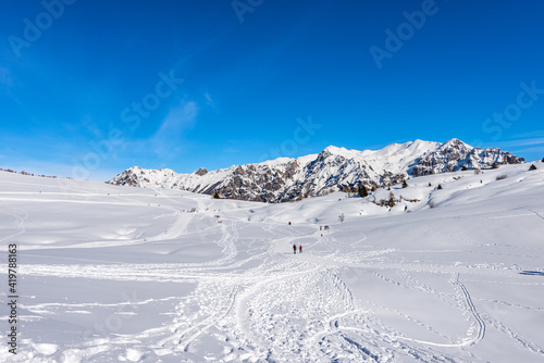 Malga San Giorgio ski resort. Lessinia High Plateau (Altopiano della Lessinia) in winter with snow and Carega Mountain (small Dolomites). Bosco Chiesanuova, Verona province, Veneto, Italy, Europe. © Alberto Masnovo