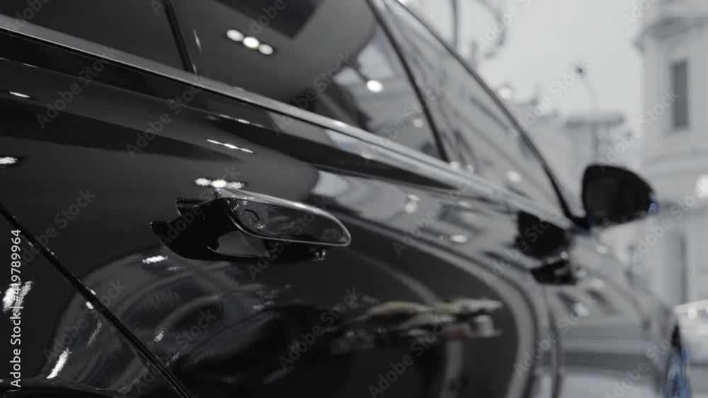 Pull-out door handles for a new prestigious car. New technology of retractable door handles on a luxury car.
Pull-out door handles for a new prestigious car. New technology of retractable door handles on a luxury car.