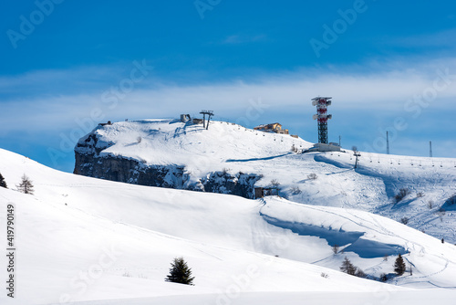 The peak of Malga San Giorgio Ski Resort in winter with snow. Lessinia High Plateau (Altopiano della Lessinia), Regional Natural Park, Bosco Chiesanuova, Verona province, Veneto, Italy, Europe. © Alberto Masnovo