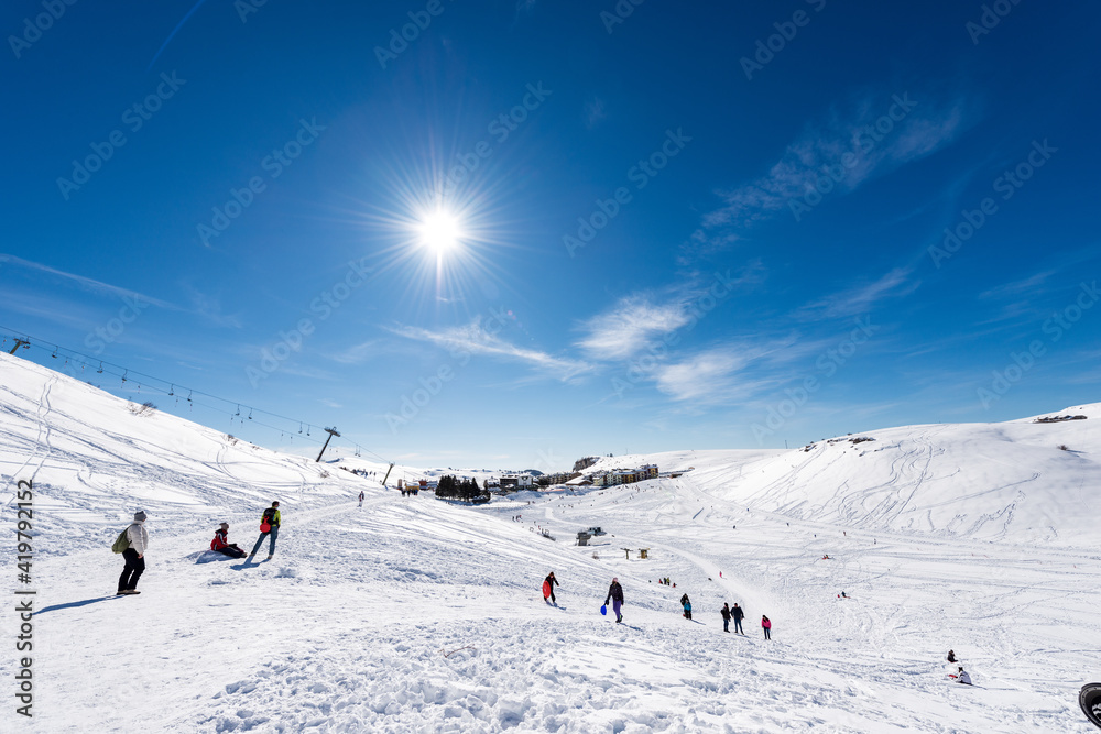 Malga San Giorgio ski resort in winter with snow. Lessinia Plateau ( Altopiano della Lessinia), Regional Natural Park, Bosco Chiesanuova Municipality, Verona province, Veneto, Italy, Europe.