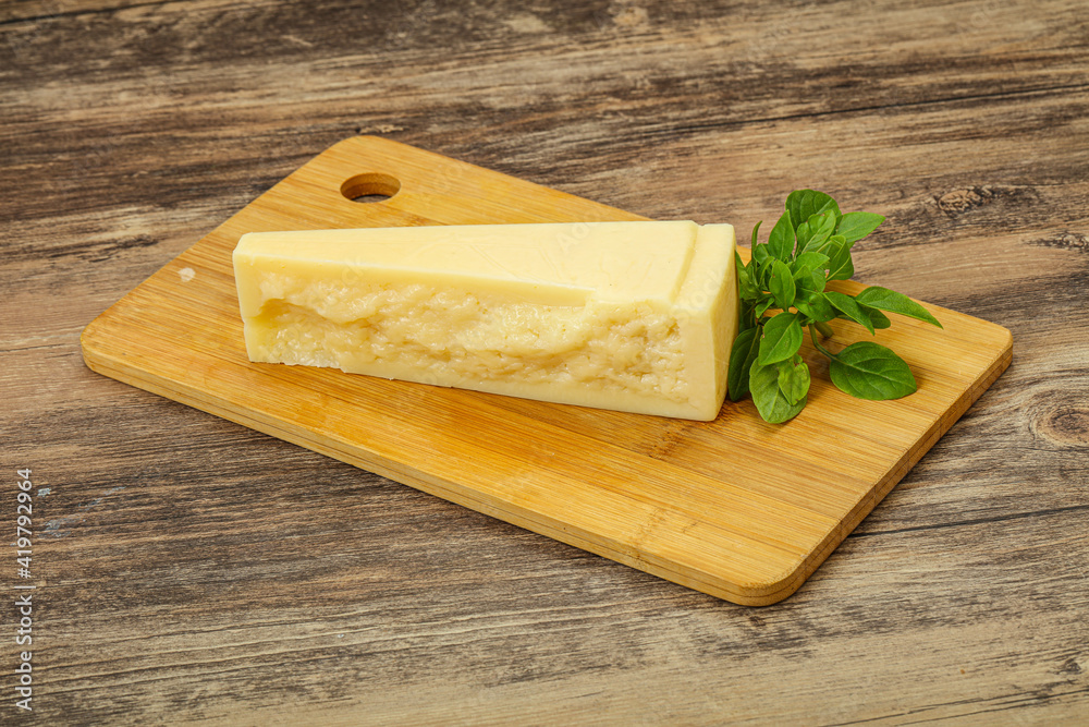 Hard parmesan cheese served basil Hard parmesan cheese served basil