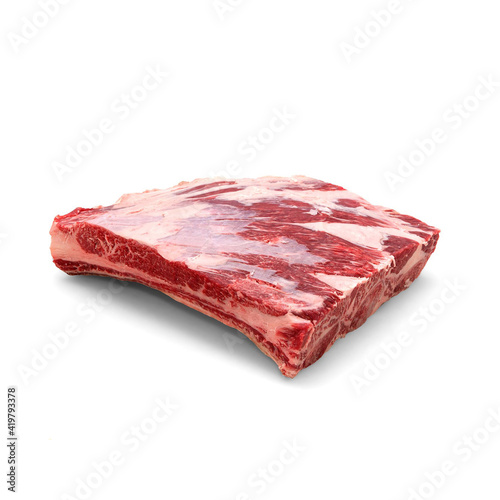 Close-up view of fresh raw Trimmed Short Ribs cut in isolated white background